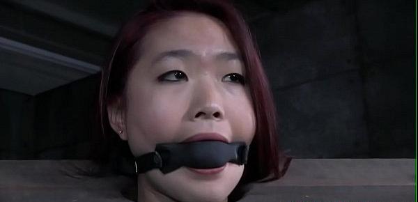  Redhead asian sub with mouth gag dominated